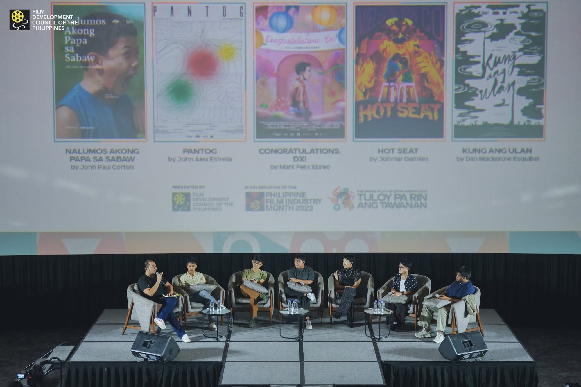 Panel discussion with all films on screen